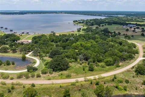 a view of a lake with a city