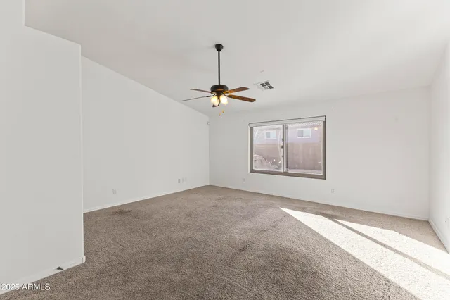 a view of a room with a window