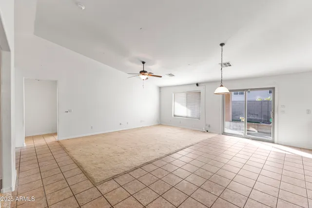a view of a kitchen with a sink and cabinets