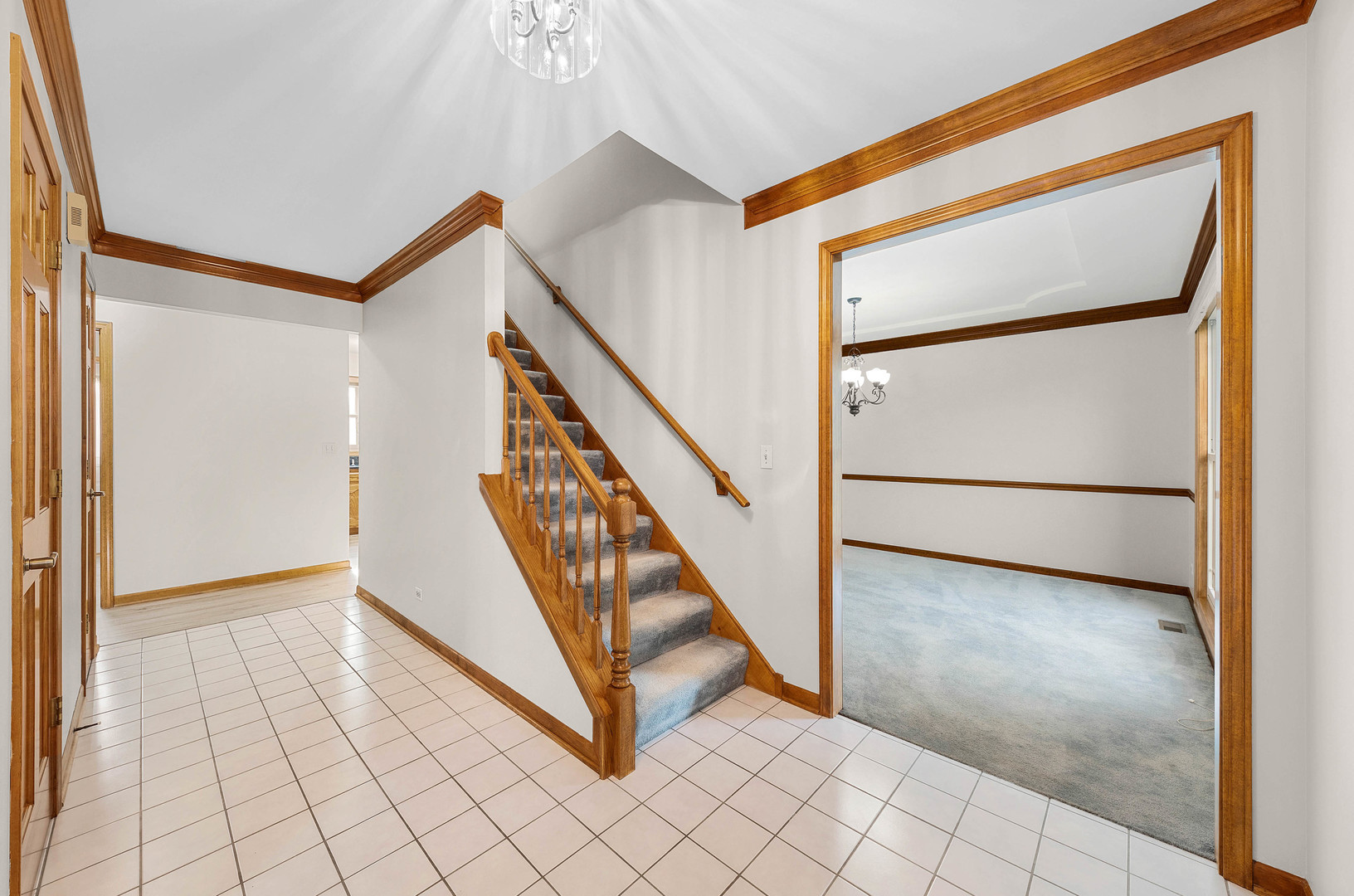 1751 Mundelein Road Naperville, IL 60565 - Photo 2 of 37 a view of a hallway with staircase