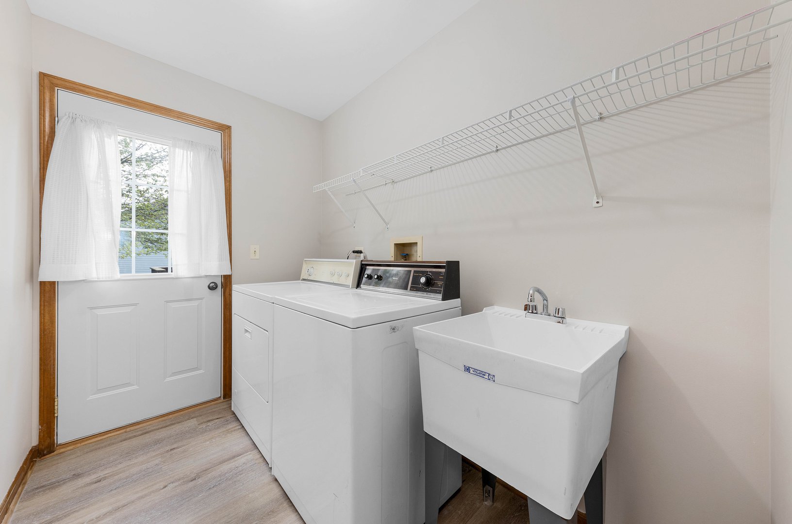 1751 Mundelein Road Naperville, IL 60565 - Photo 19 of 37 a utility room with dryer and washer