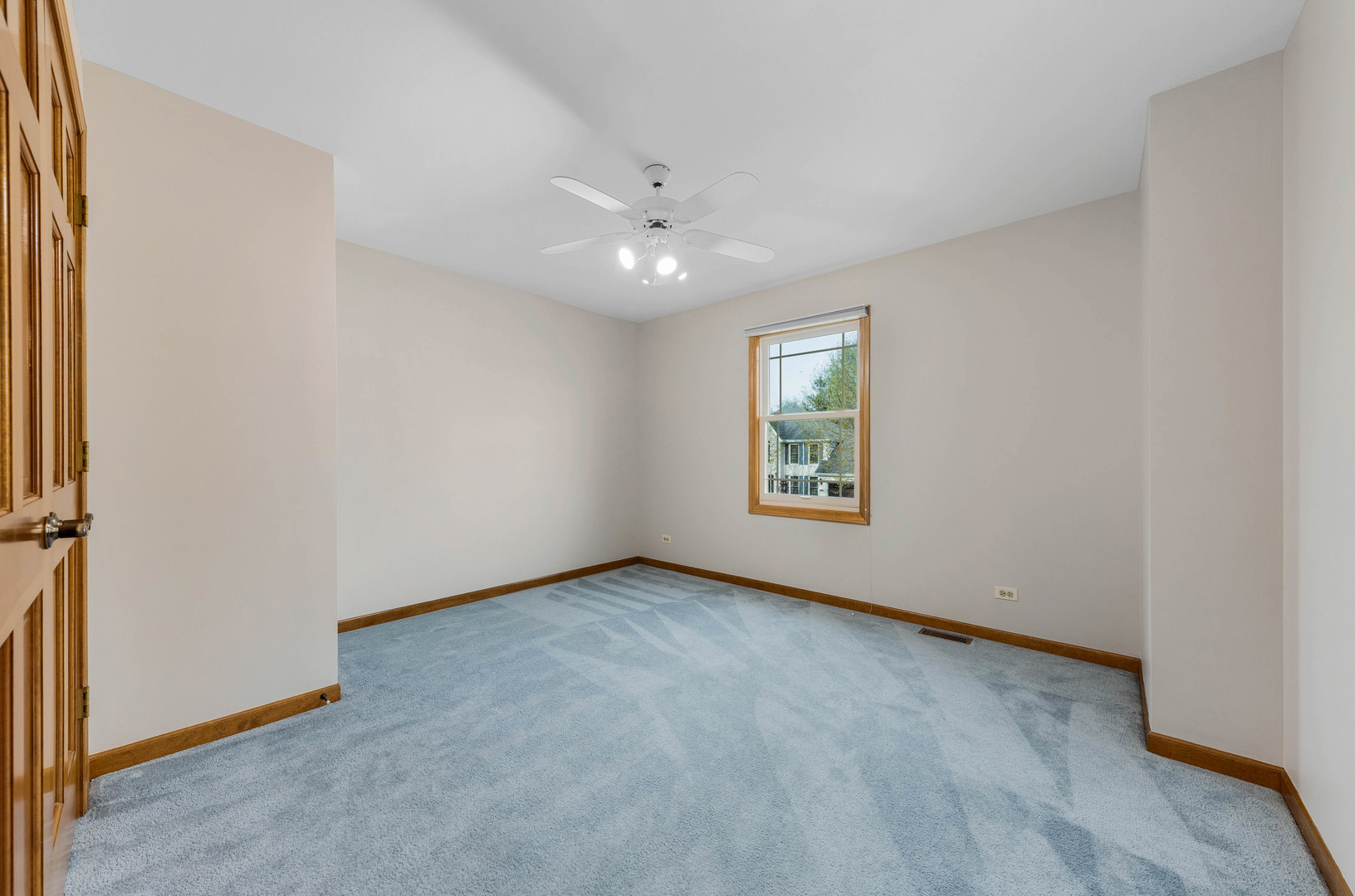 1751 Mundelein Road Naperville, IL 60565 - Photo 26 of 37 an empty room with windows and fan