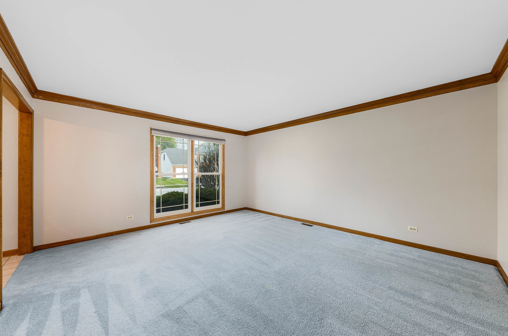 1751 Mundelein Road Naperville, IL 60565 - Photo 4 of 37 a view of an empty room with a window