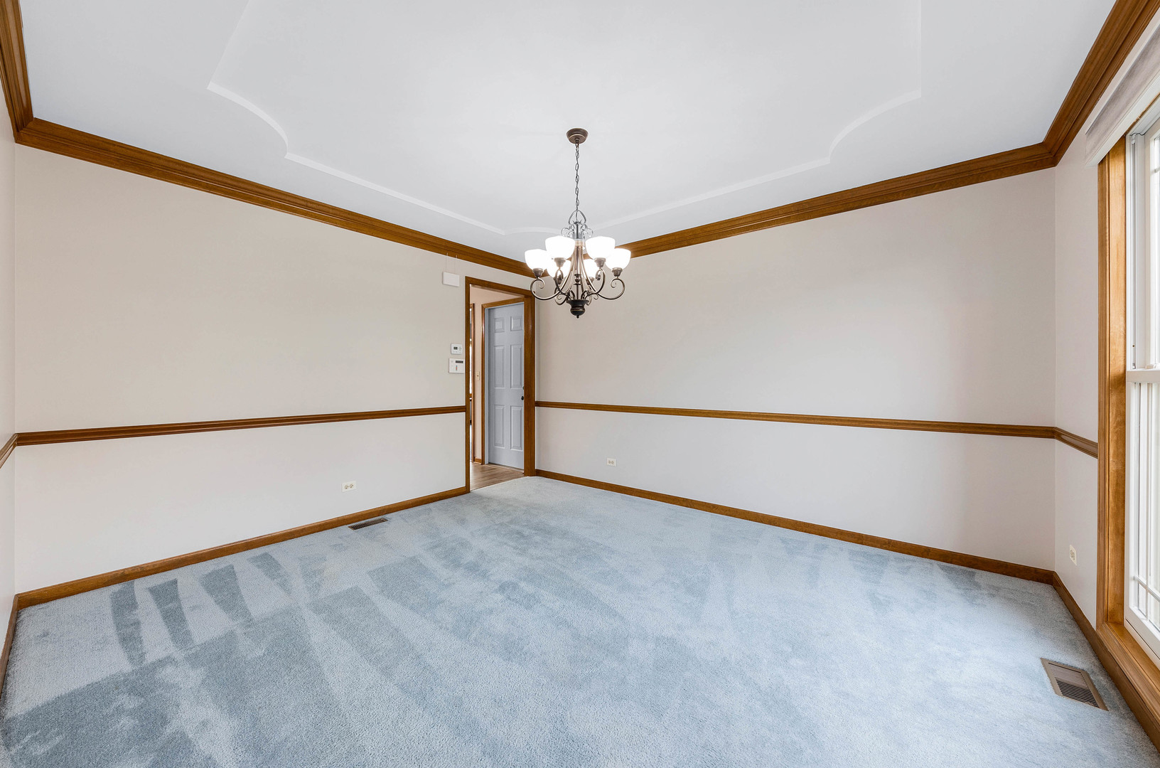 1751 Mundelein Road Naperville, IL 60565 - Photo 6 of 37 a view of a big room with carpet