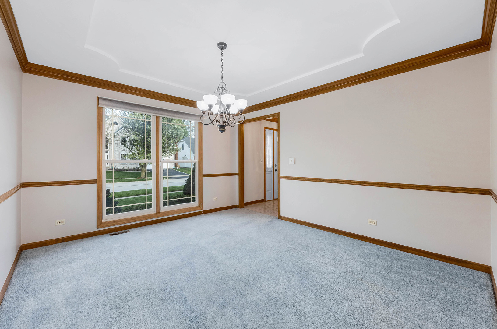 1751 Mundelein Road Naperville, IL 60565 - Photo 7 of 37 a view of an empty room with chandelier