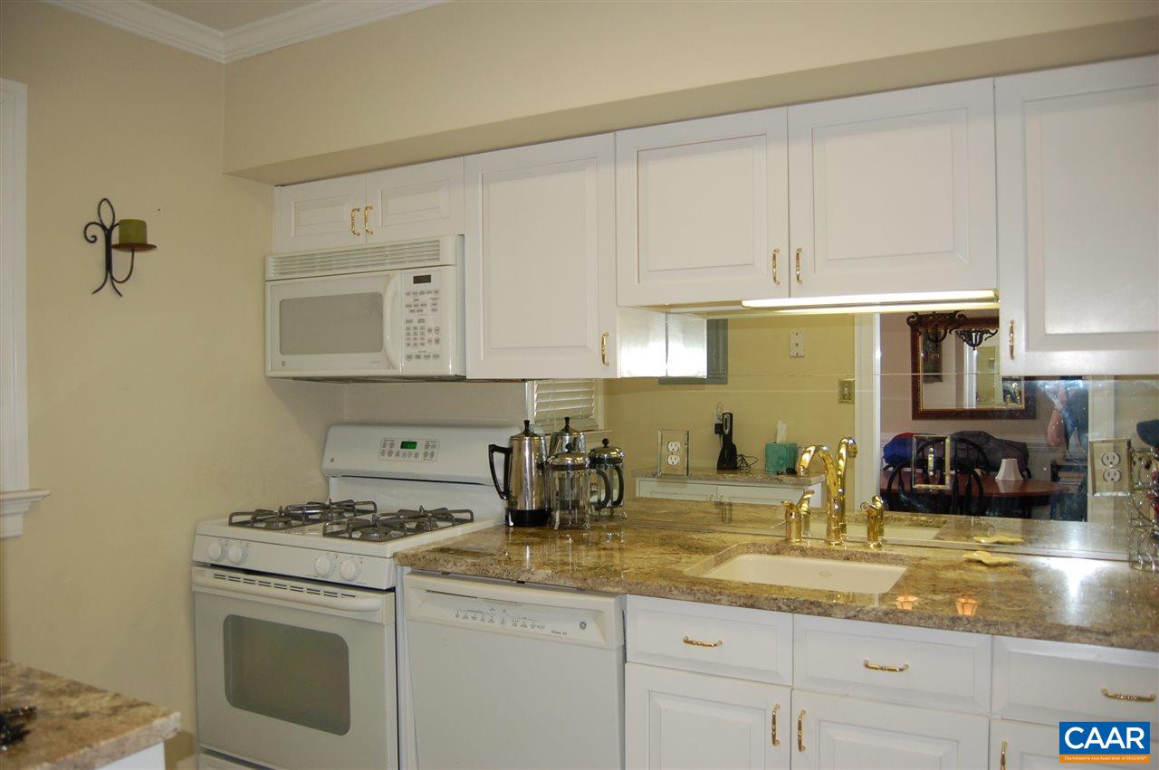 118 Hessian Hills Ridge, Unit 2 Charlottesville, VA 22901 - Photo 2 of 11 a kitchen with sink a stove and cabinets