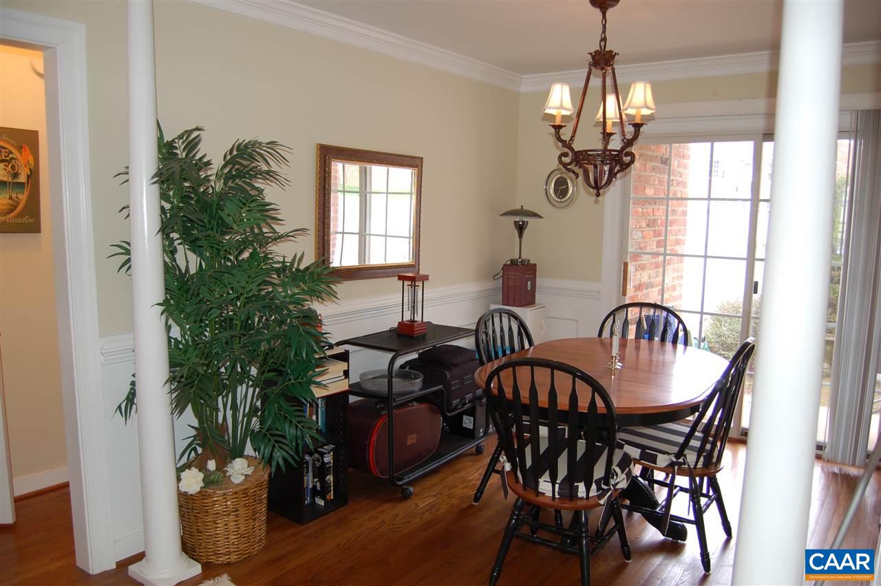 118 Hessian Hills Ridge, Unit 2 Charlottesville, VA 22901 - Photo 6 of 11 a view of a dining room with furniture window and wooden floor