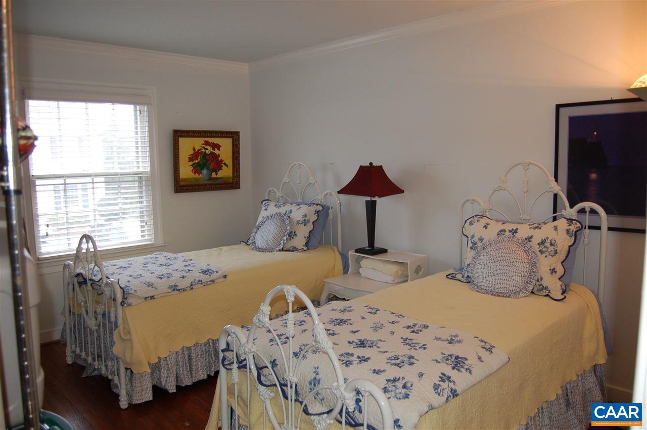 118 Hessian Hills Ridge, Unit 2 Charlottesville, VA 22901 - Photo 8 of 11 a bedroom with two beds and a window