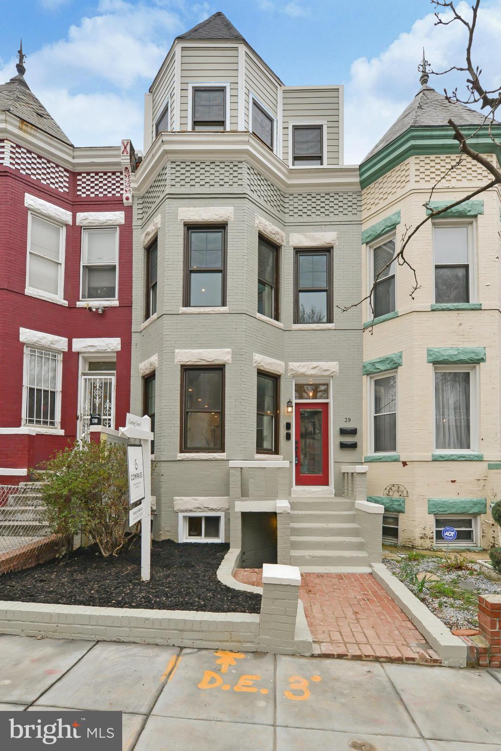 a front view of a multi story residential apartment building