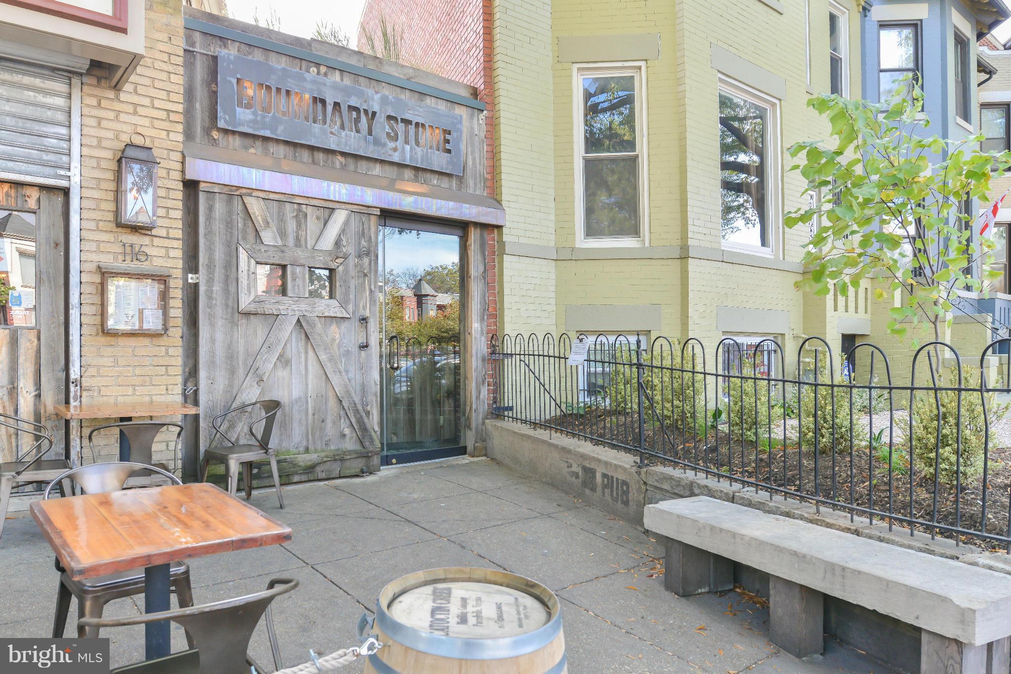 39 U Street Northeast, Unit 1 Washington, DC 20002 - Photo 26 of 27 a balcony with table and chairs