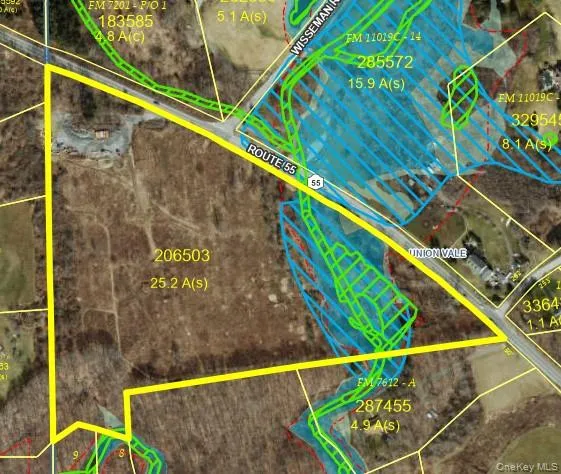 a view of houses with a street