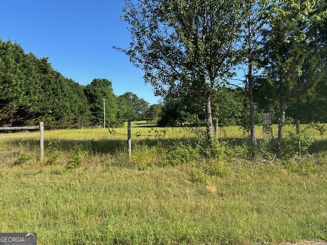 0 Simmons Road, Unit TRACT 1 Social Circle, GA 30025 - Photo 2 of 30 a view of lake with green space