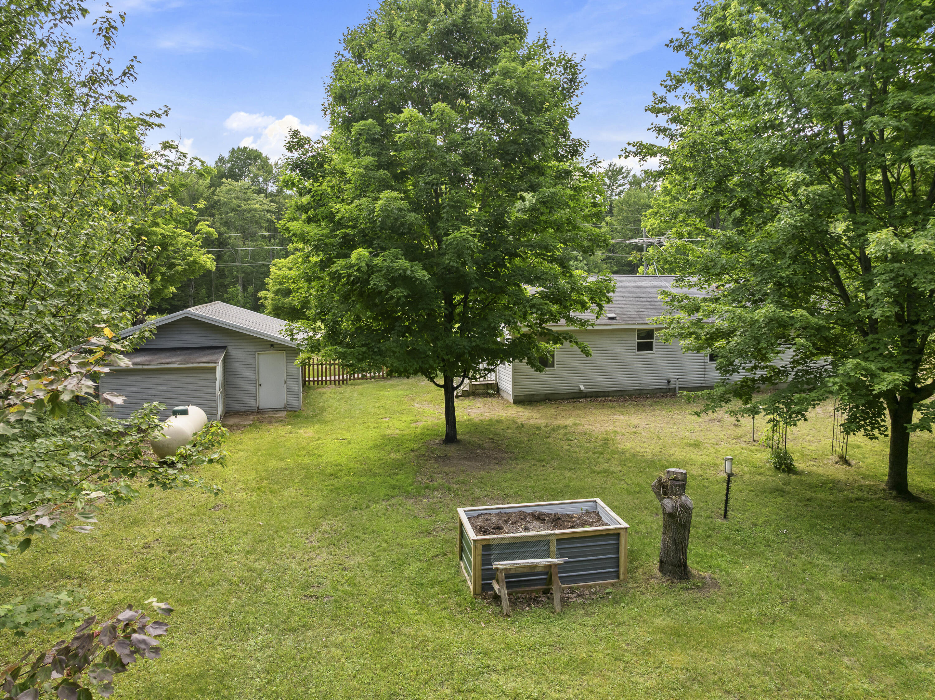 3839 Wallaker Road Benzonia, MI 49616 - Photo 6 of 37 DJI_20260629165031_0025_D