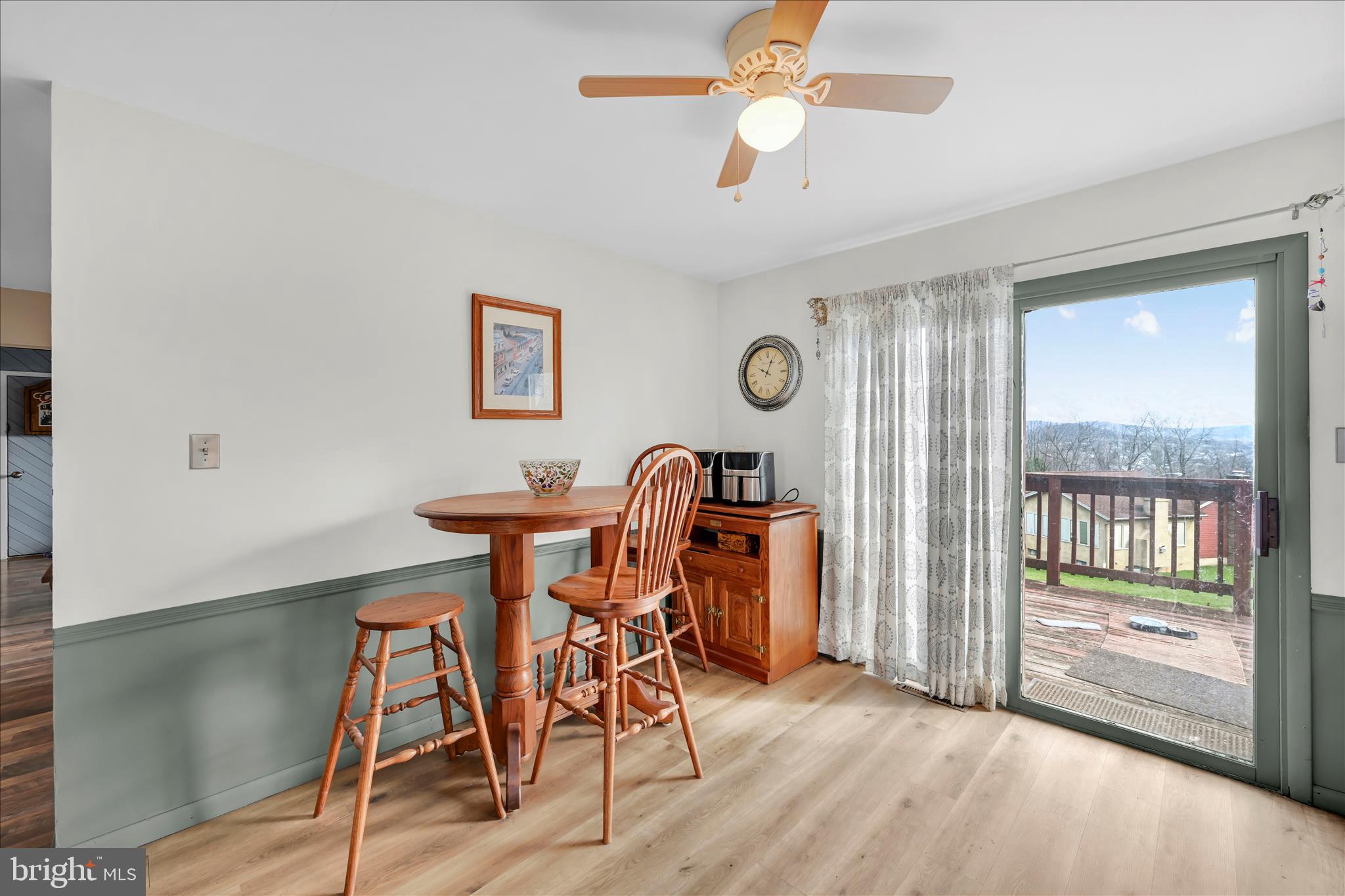 205 Pembroke Drive Reading, PA 19607 - Photo 13 of 40 a view of a dining room with furniture and a large window