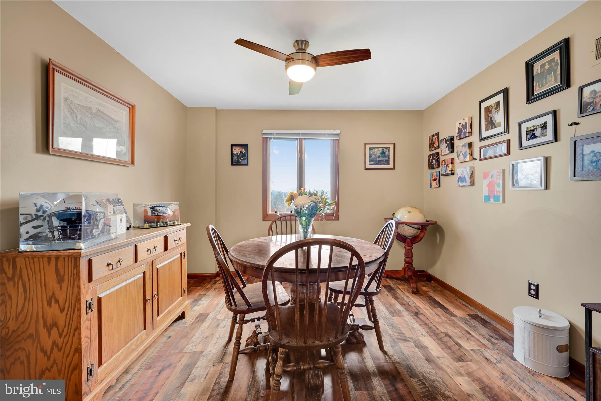 205 Pembroke Drive Reading, PA 19607 - Photo 14 of 40 a view of a dining room with furniture and a chandelier