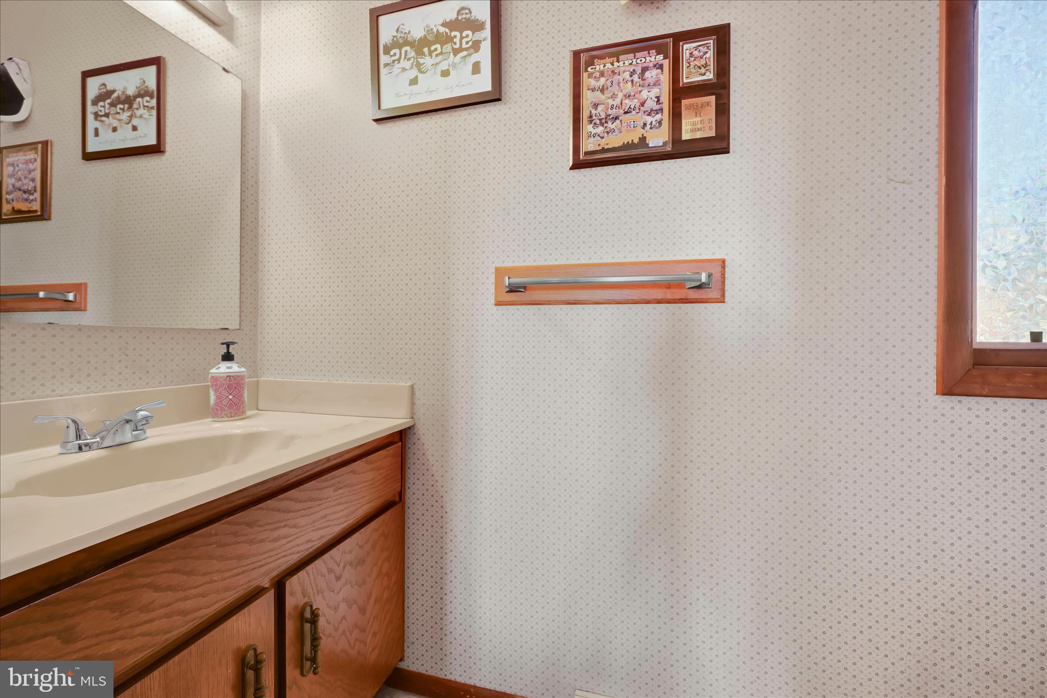 205 Pembroke Drive Reading, PA 19607 - Photo 20 of 40 a bathroom with a sink and a mirror