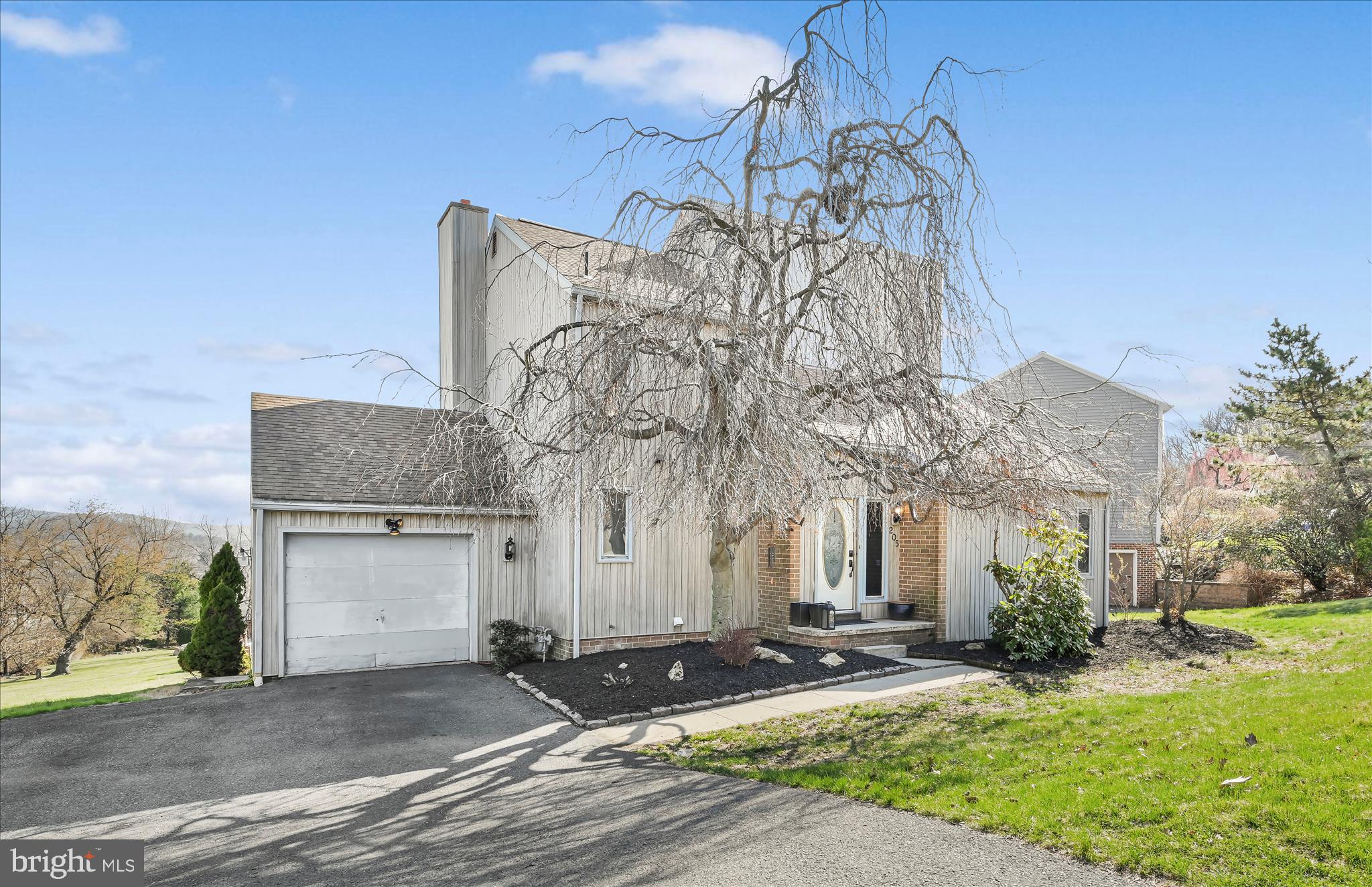 205 Pembroke Drive Reading, PA 19607 - Photo 2 of 40 a view of a house with a yard