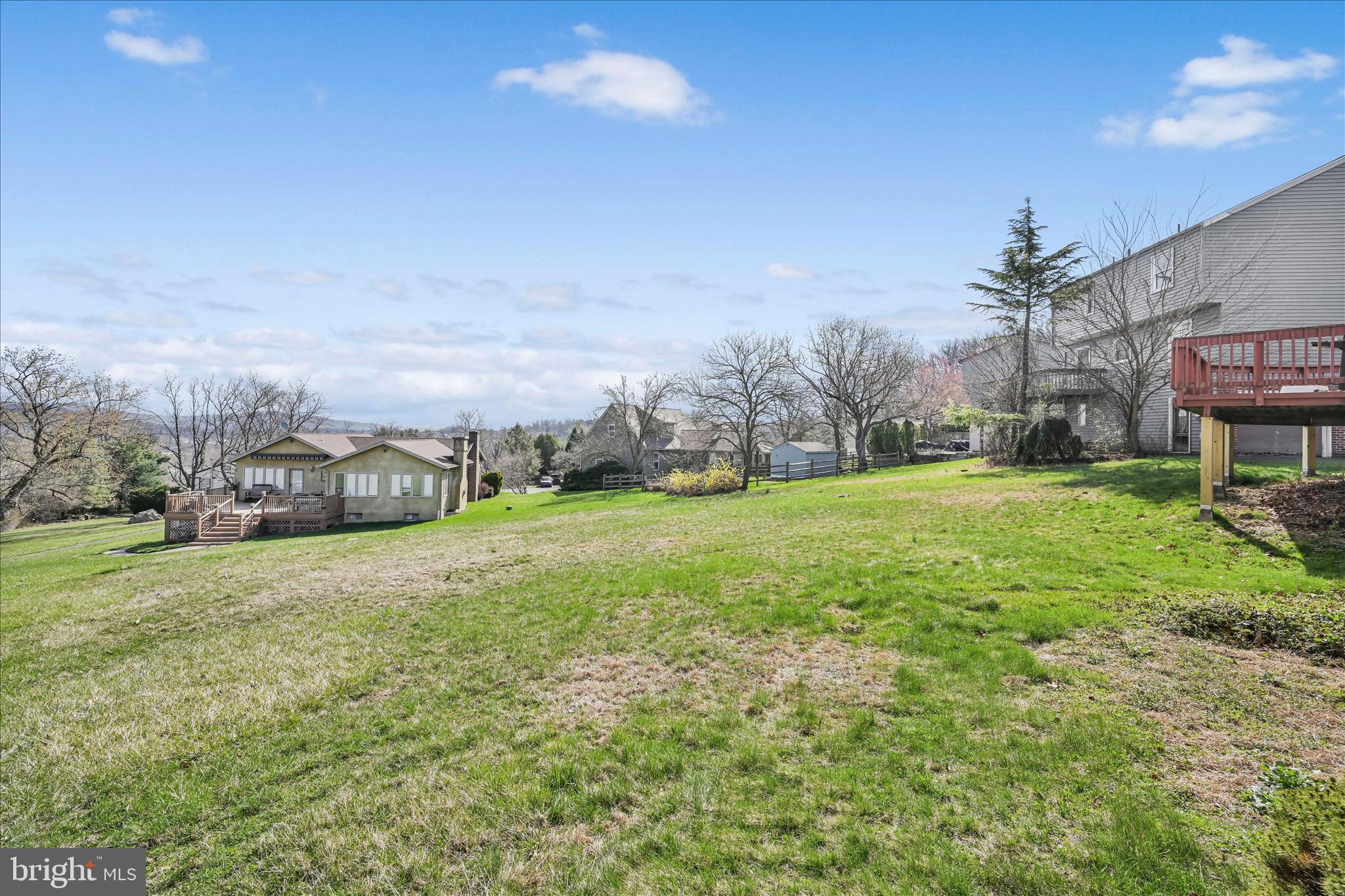 205 Pembroke Drive Reading, PA 19607 - Photo 28 of 40 a view of a house with a yard