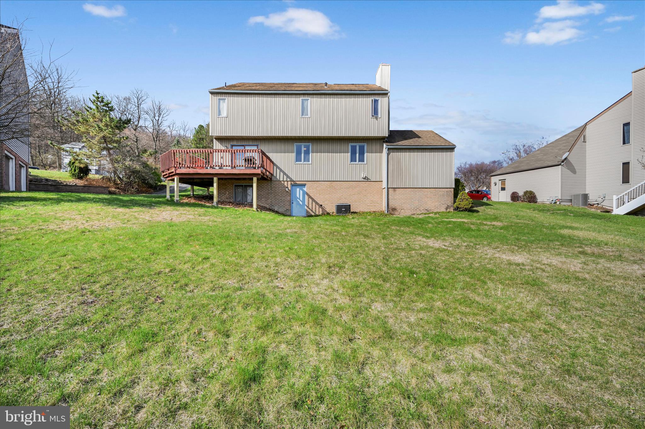 205 Pembroke Drive Reading, PA 19607 - Photo 30 of 40 a front view of a house with a yard and garage