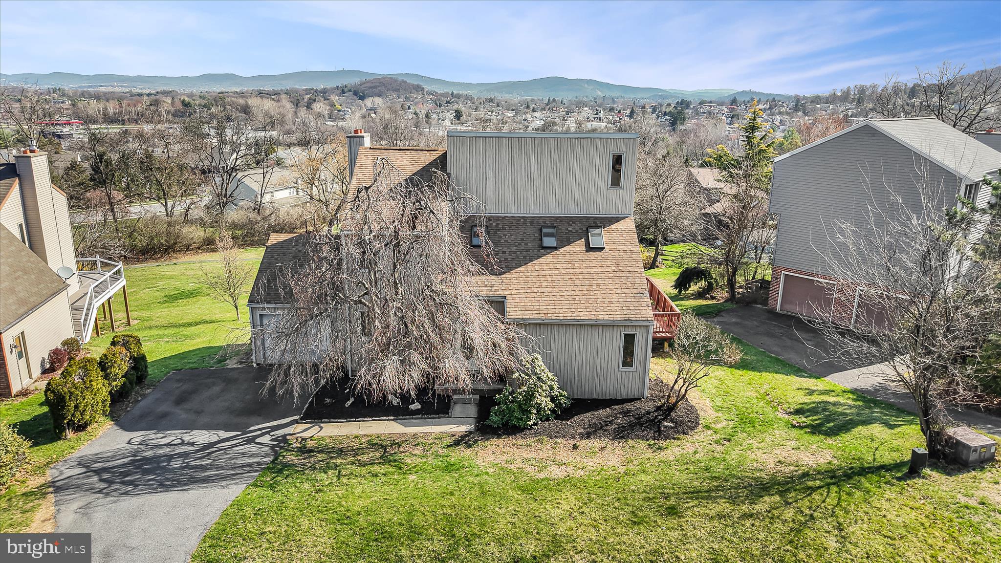 205 Pembroke Drive Reading, PA 19607 - Photo 3 of 40 an aerial view of a house with a yard