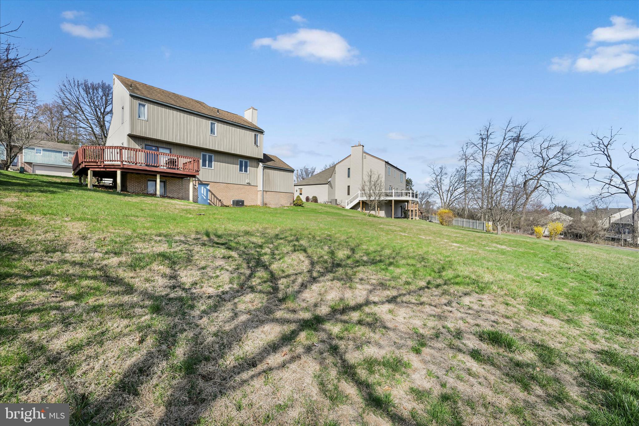 205 Pembroke Drive Reading, PA 19607 - Photo 32 of 40 a view of a house with a big yard and large trees