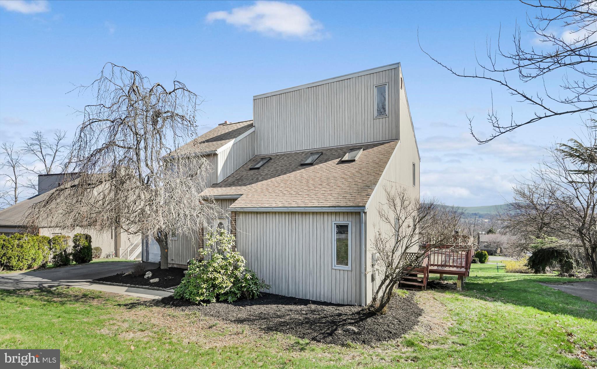 205 Pembroke Drive Reading, PA 19607 - Photo 35 of 40 a view of a house with a yard