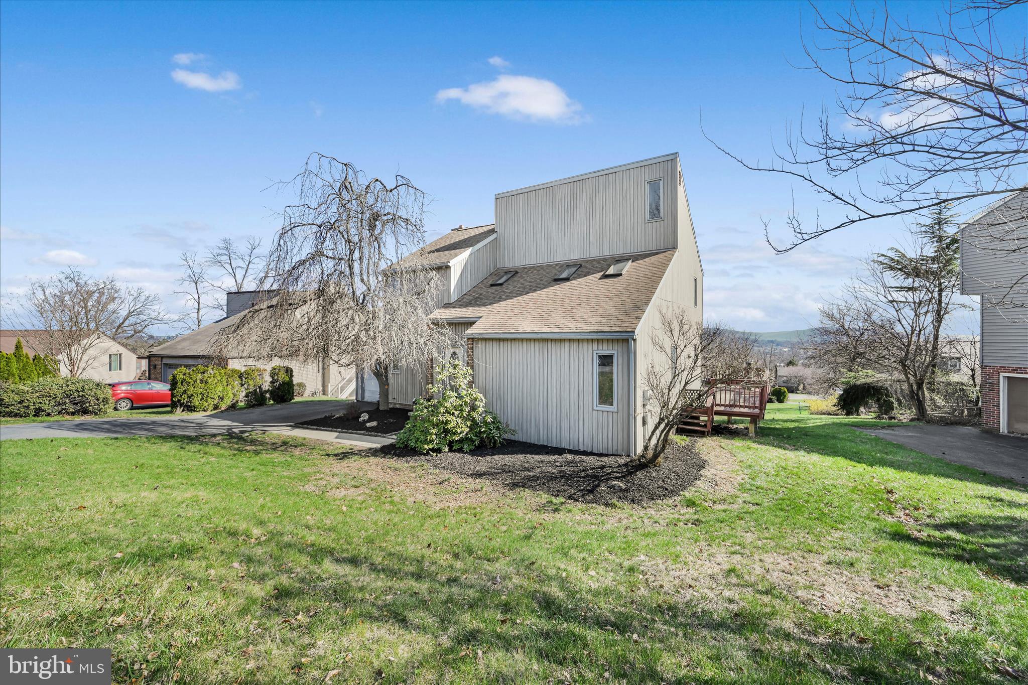 205 Pembroke Drive Reading, PA 19607 - Photo 36 of 40 a view of a house with a yard and pathway