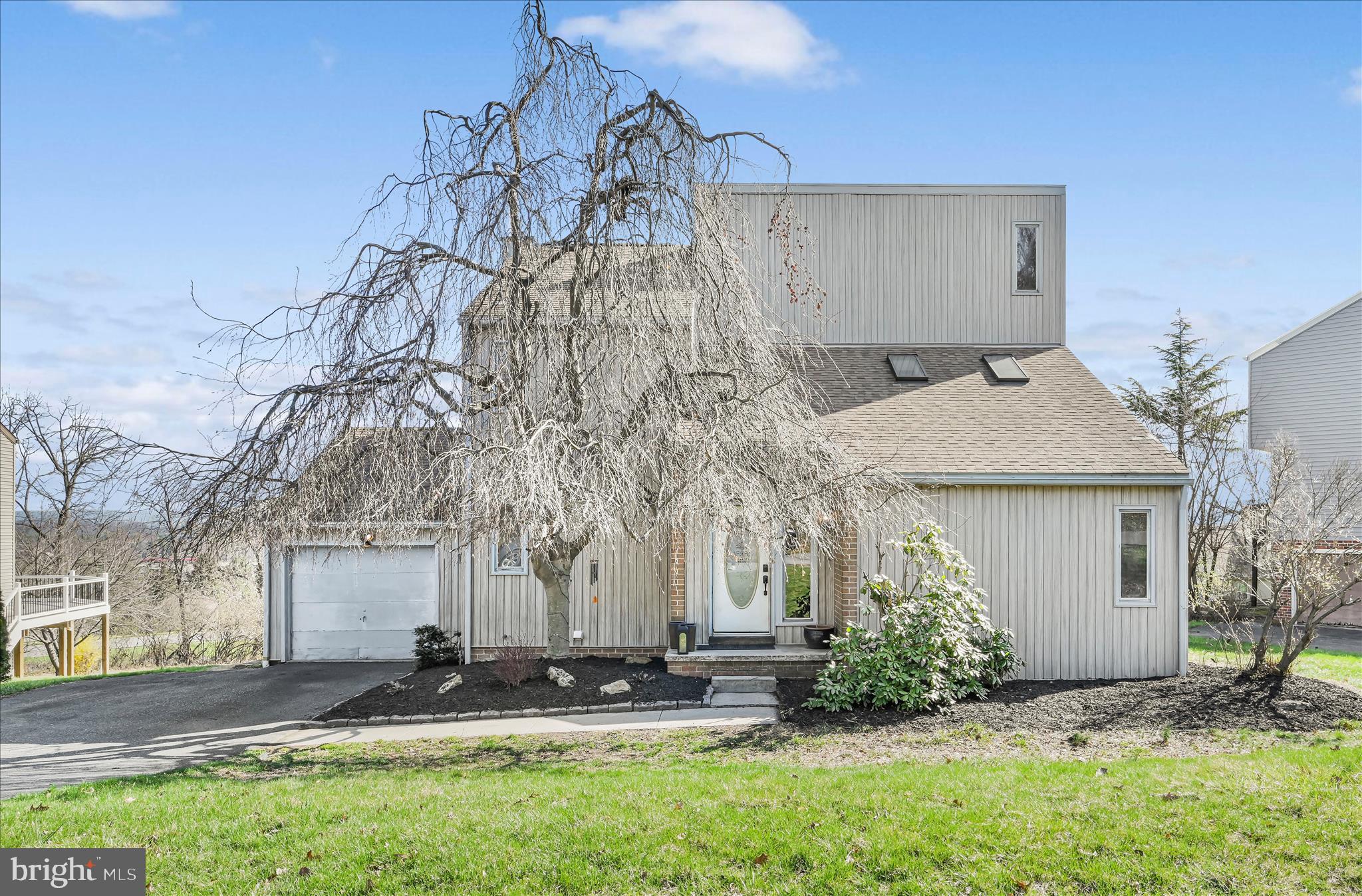205 Pembroke Drive Reading, PA 19607 - Photo 4 of 40 a front view of a house with garden