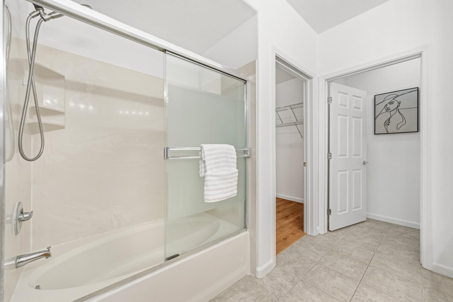 1390 Saddle Rack Street, Unit 223 San Jose, CA 95126 - Photo 15 of 36 a bathroom with a shower and a bath tub