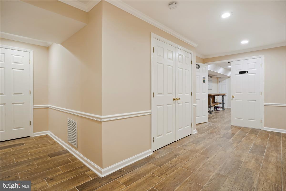 1500 Turtle Rock Lane Reston, VA 20194 - Photo 53 of 76 Beautiful Porcelain Tile Flooring in Lower Level