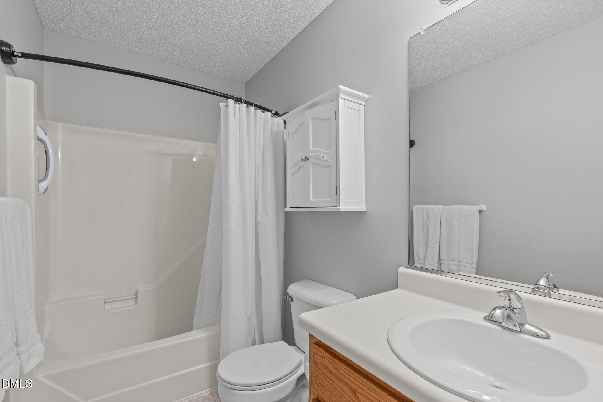 46 Budd Godwin Lane Dunn, NC 28334 - Photo 22 of 33 a bathroom with a sink toilet and shower