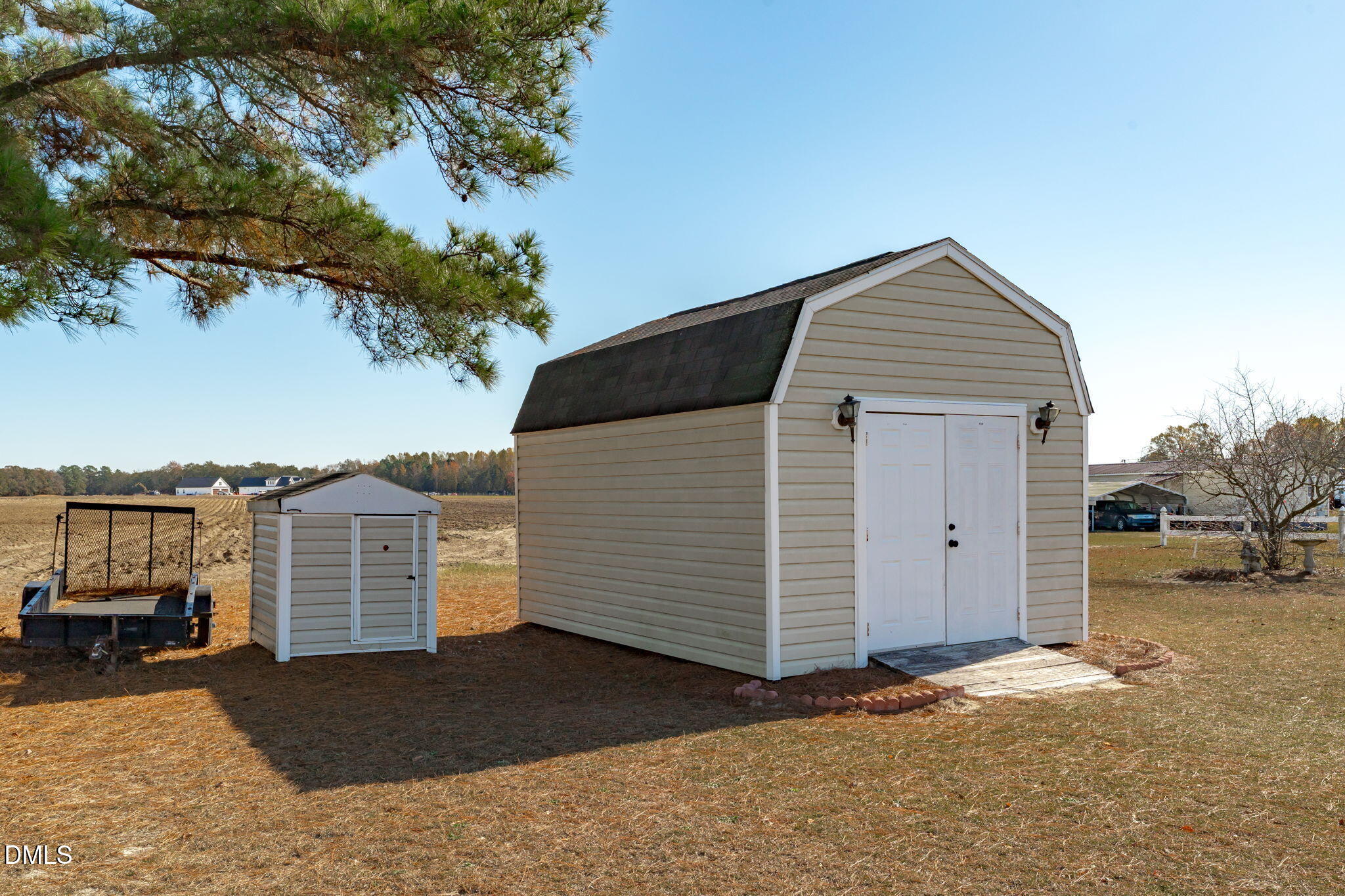 46 Budd Godwin Lane Dunn, NC 28334 - Photo 27 of 33 a front view of a house with a yard