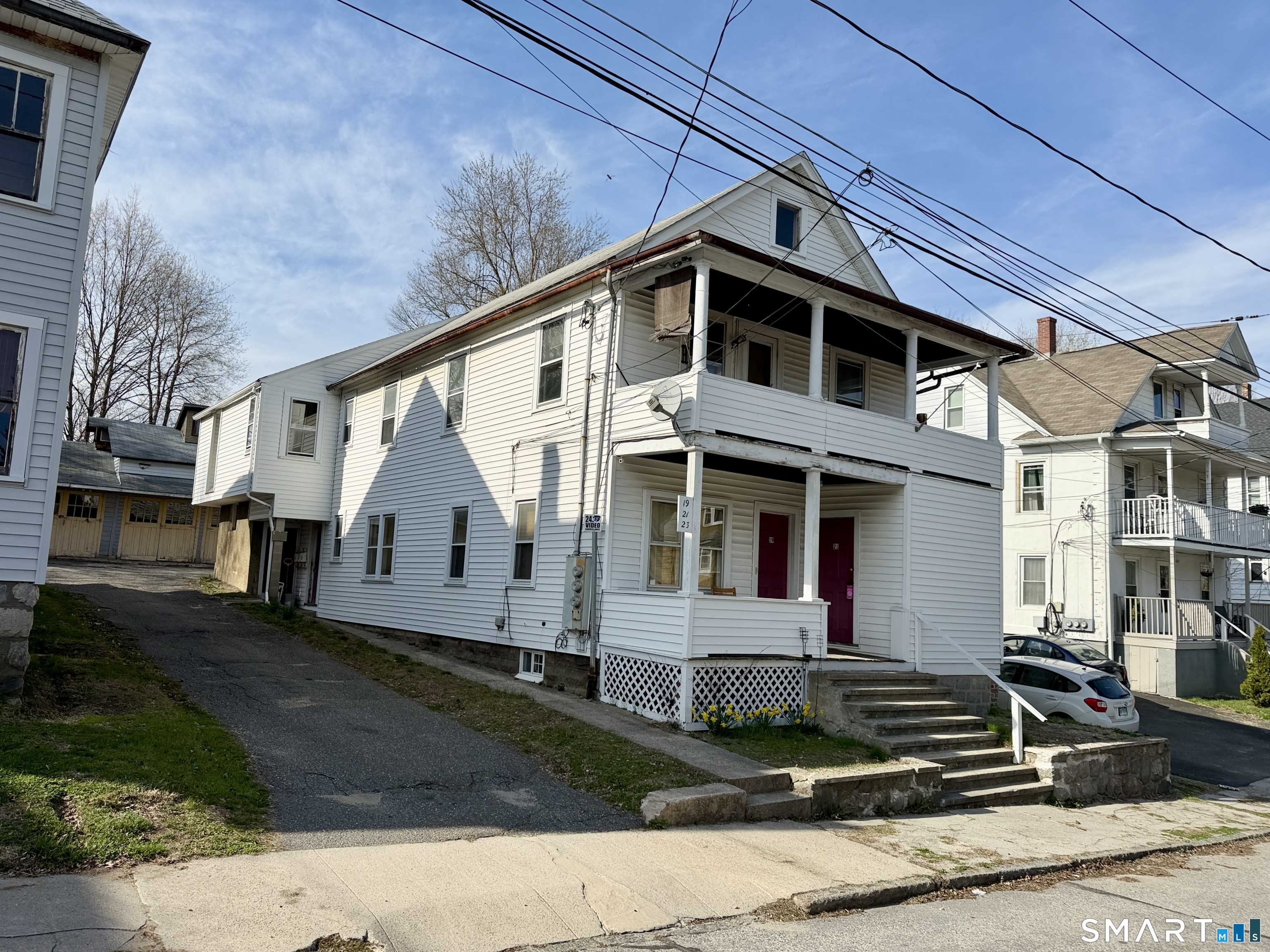 23 Farnham Avenue Torrington, CT 06790 - Photo 1 of 11 a front view of a house with a yard