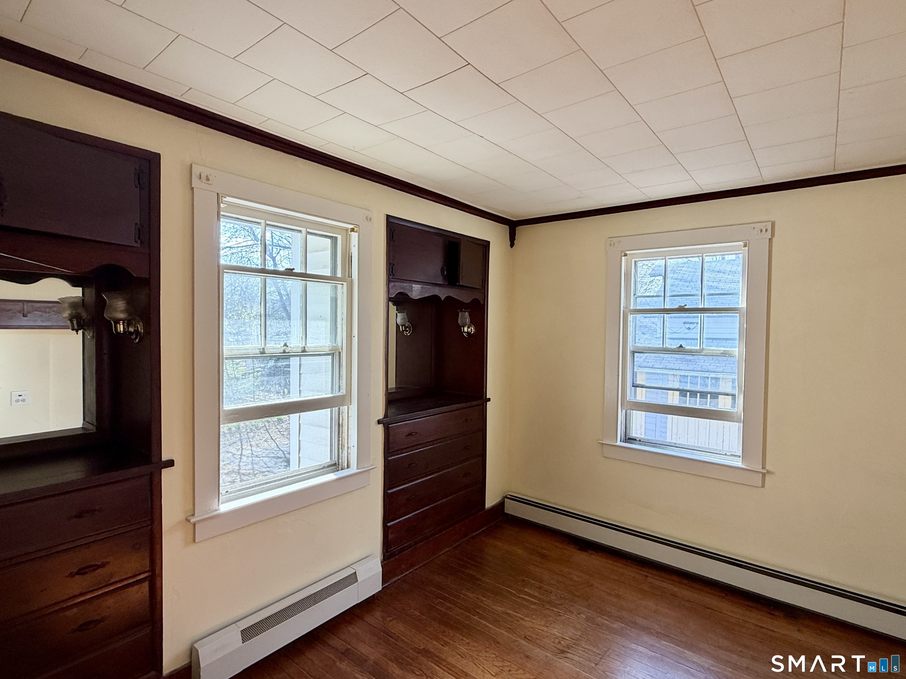 23 Farnham Avenue Torrington, CT 06790 - Photo 5 of 11 an empty room with windows