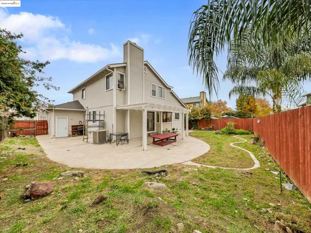 a view of a house with swimming pool