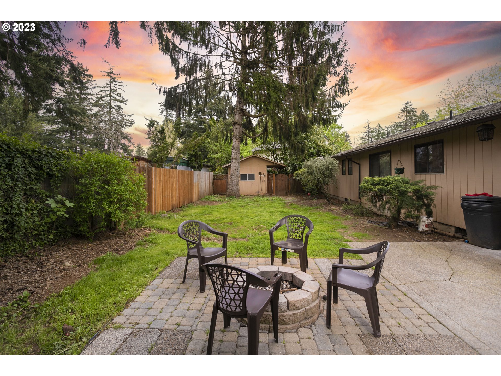 12705 Southeast Kelly Street Portland, OR 97236 - Photo 27 of 33 a view of a house with backyard and sitting area