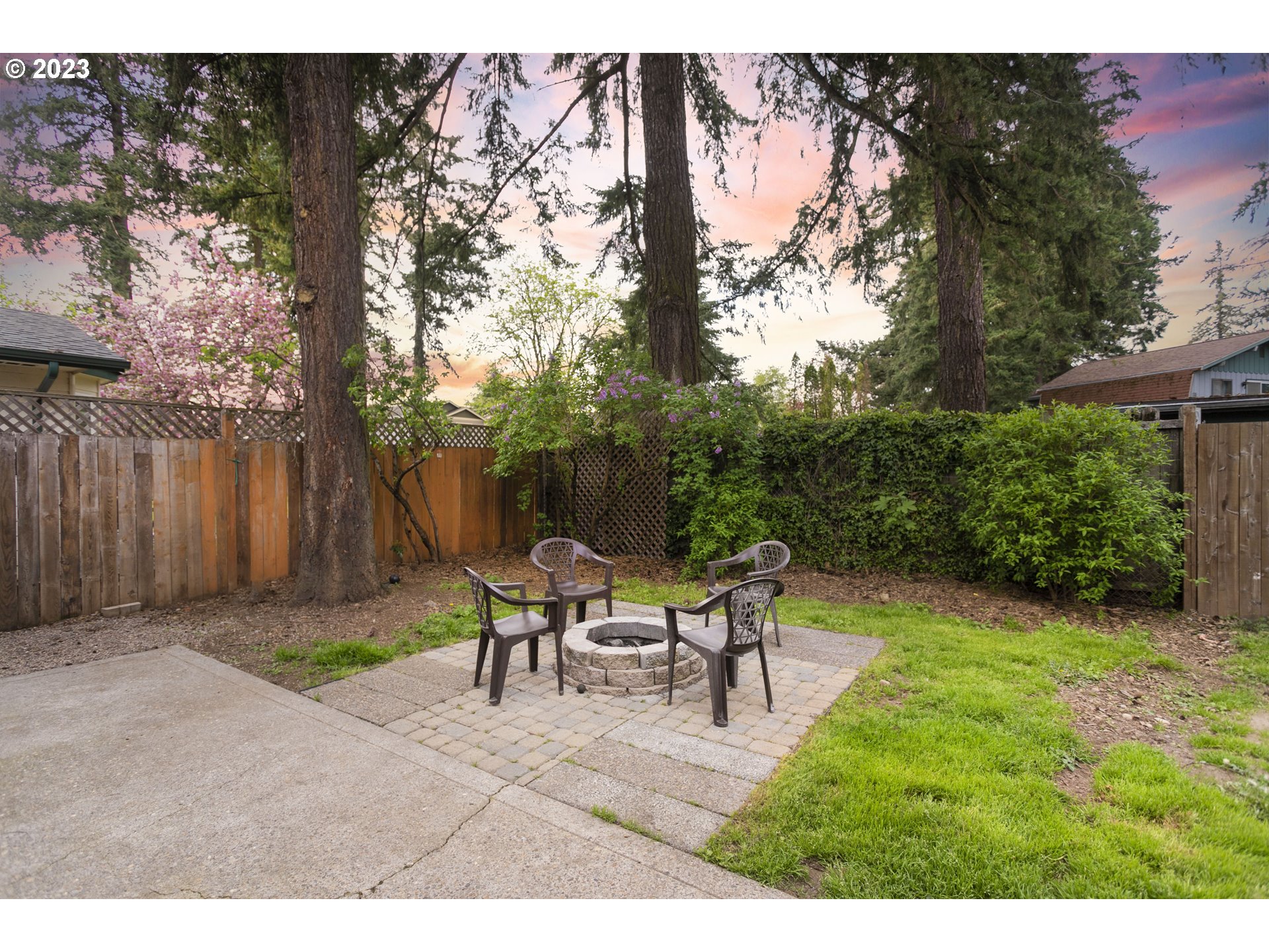 12705 Southeast Kelly Street Portland, OR 97236 - Photo 28 of 33 a view of a backyard with sitting area