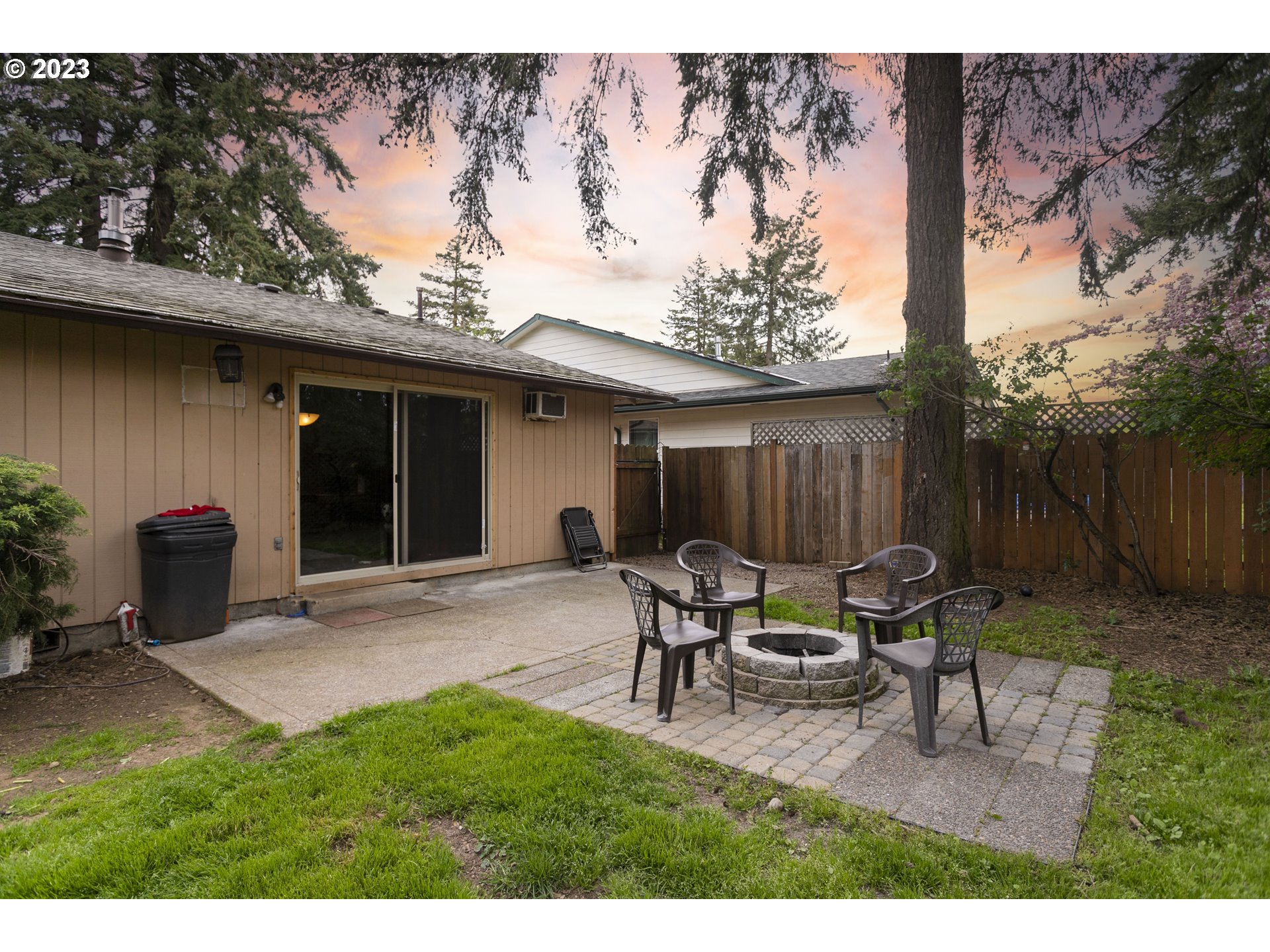 12705 Southeast Kelly Street Portland, OR 97236 - Photo 30 of 33 a view of a house with backyard and sitting area