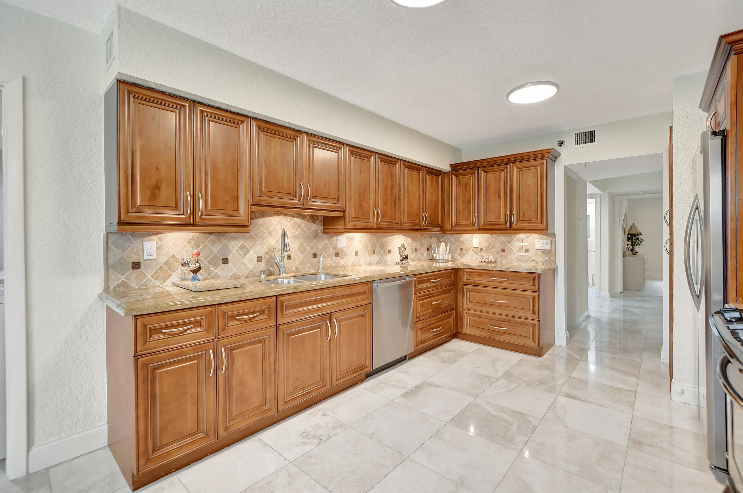 7572 Regency Lake Drive, Unit 201 Boca Raton, FL 33433 - Photo 18 of 50 kitchen