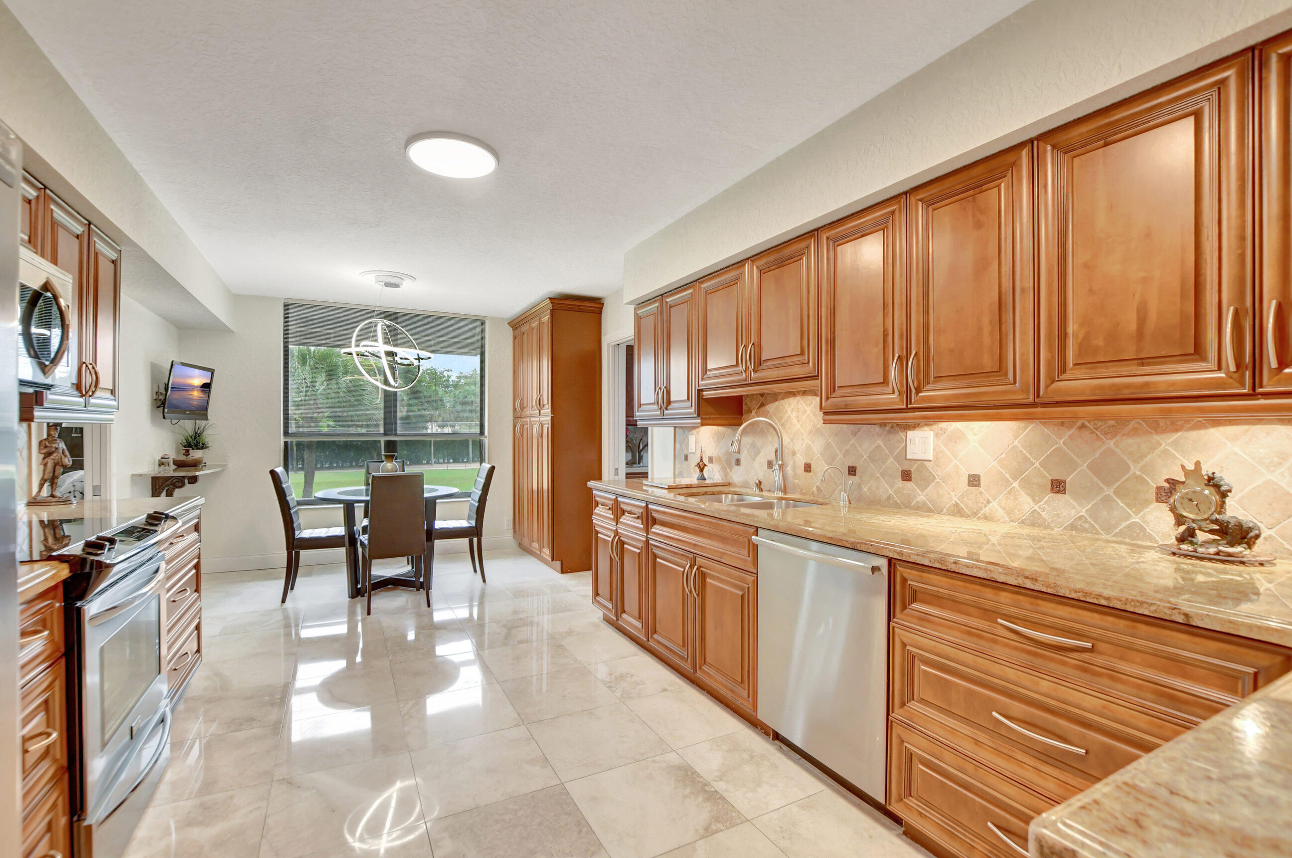 7572 Regency Lake Drive, Unit 201 Boca Raton, FL 33433 - Photo 20 of 50 kitchen