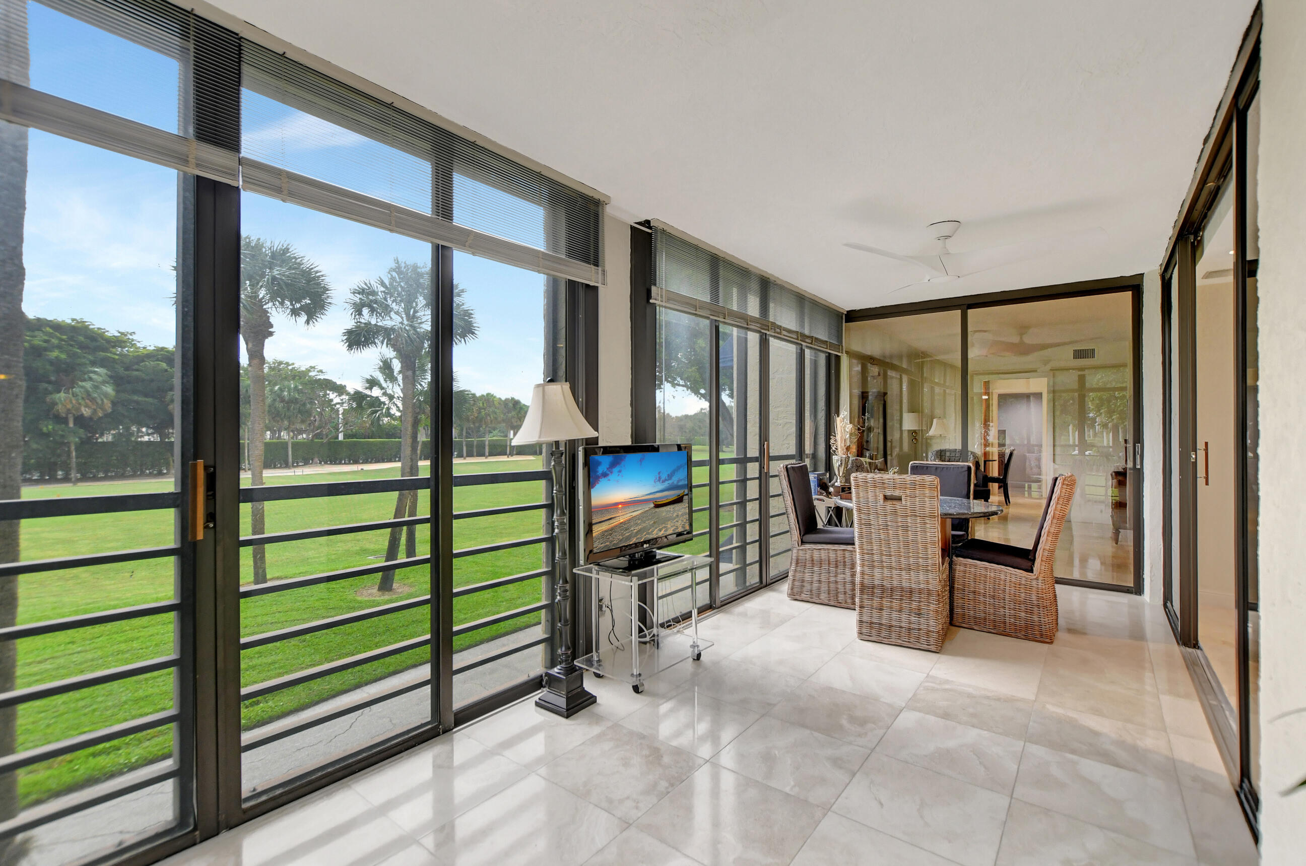 7572 Regency Lake Drive, Unit 201 Boca Raton, FL 33433 - Photo 23 of 50 enclosed patio