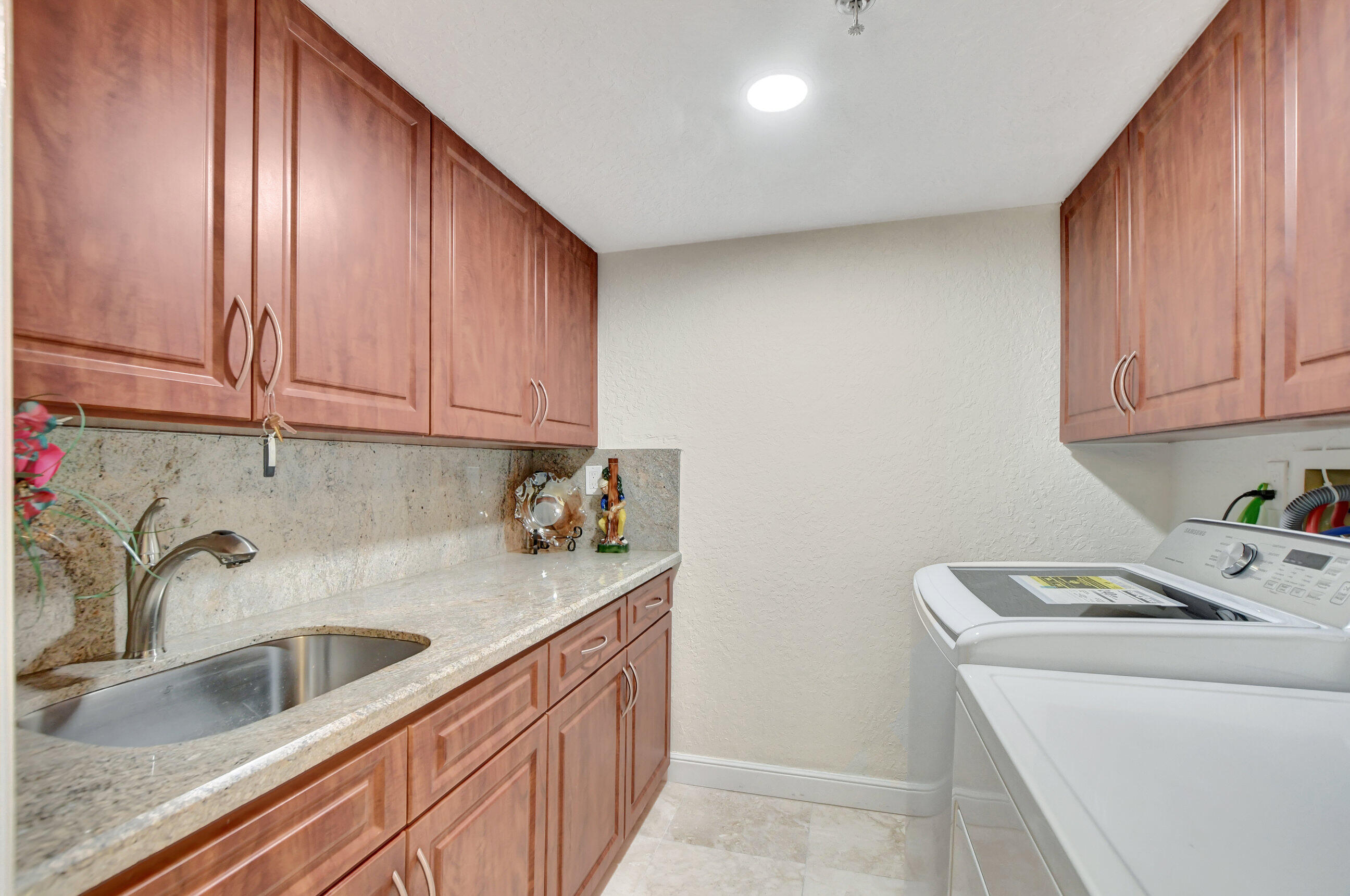 7572 Regency Lake Drive, Unit 201 Boca Raton, FL 33433 - Photo 36 of 50 laundry room