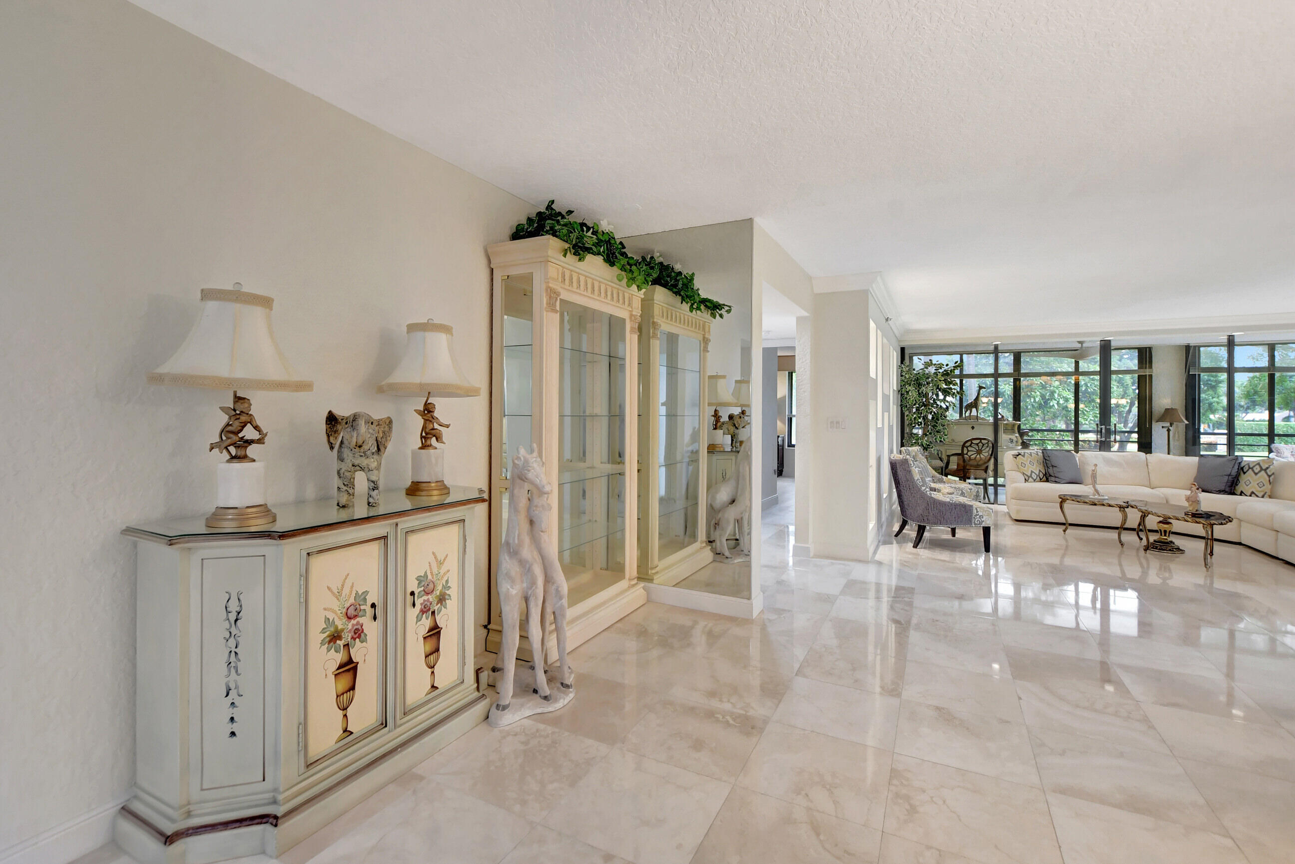 7572 Regency Lake Drive, Unit 201 Boca Raton, FL 33433 - Photo 8 of 50 foyer
