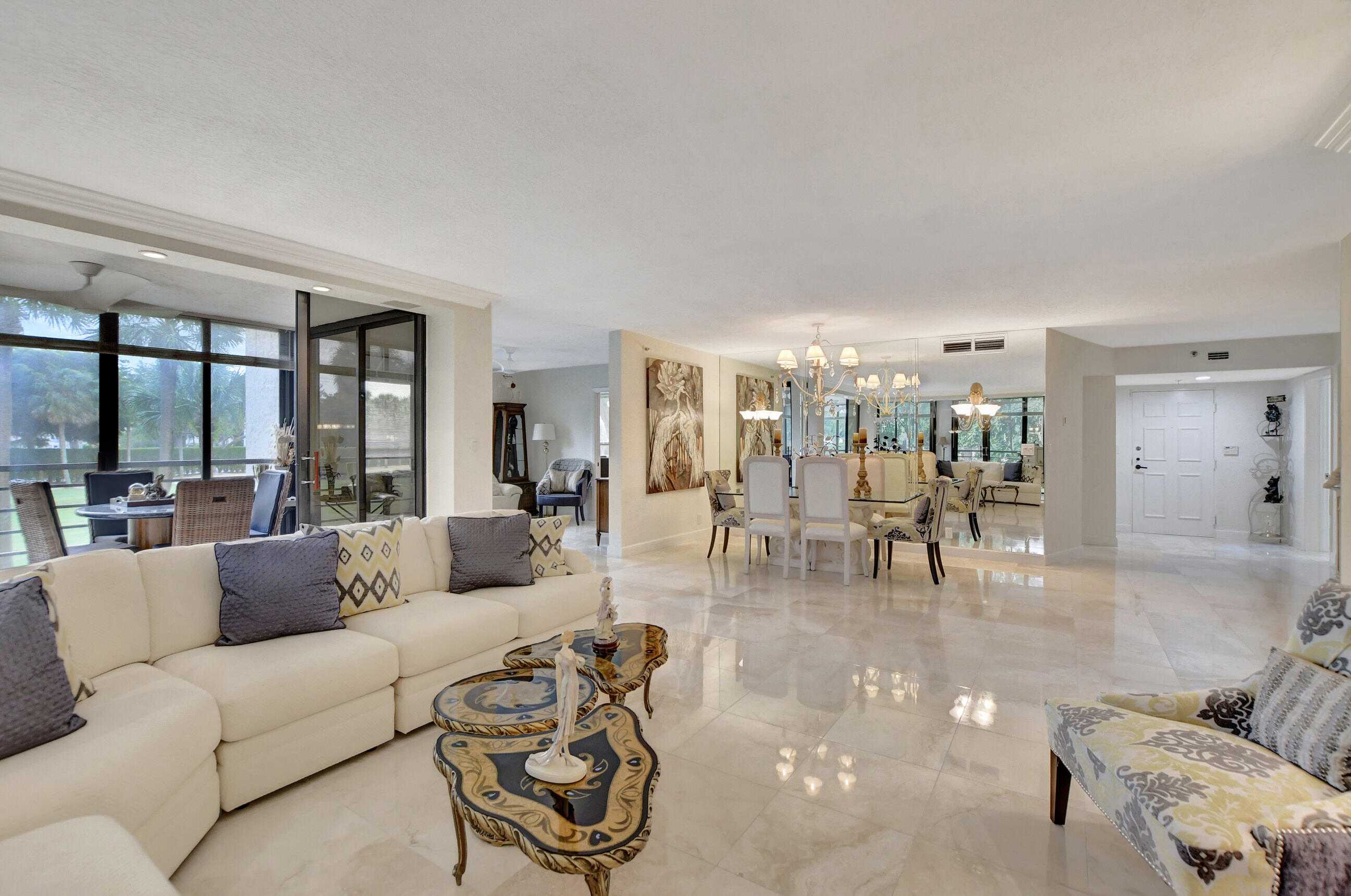 7572 Regency Lake Drive, Unit 201 Boca Raton, FL 33433 - Photo 9 of 50 living room