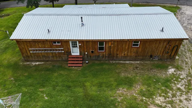 a view of outdoor space and yard