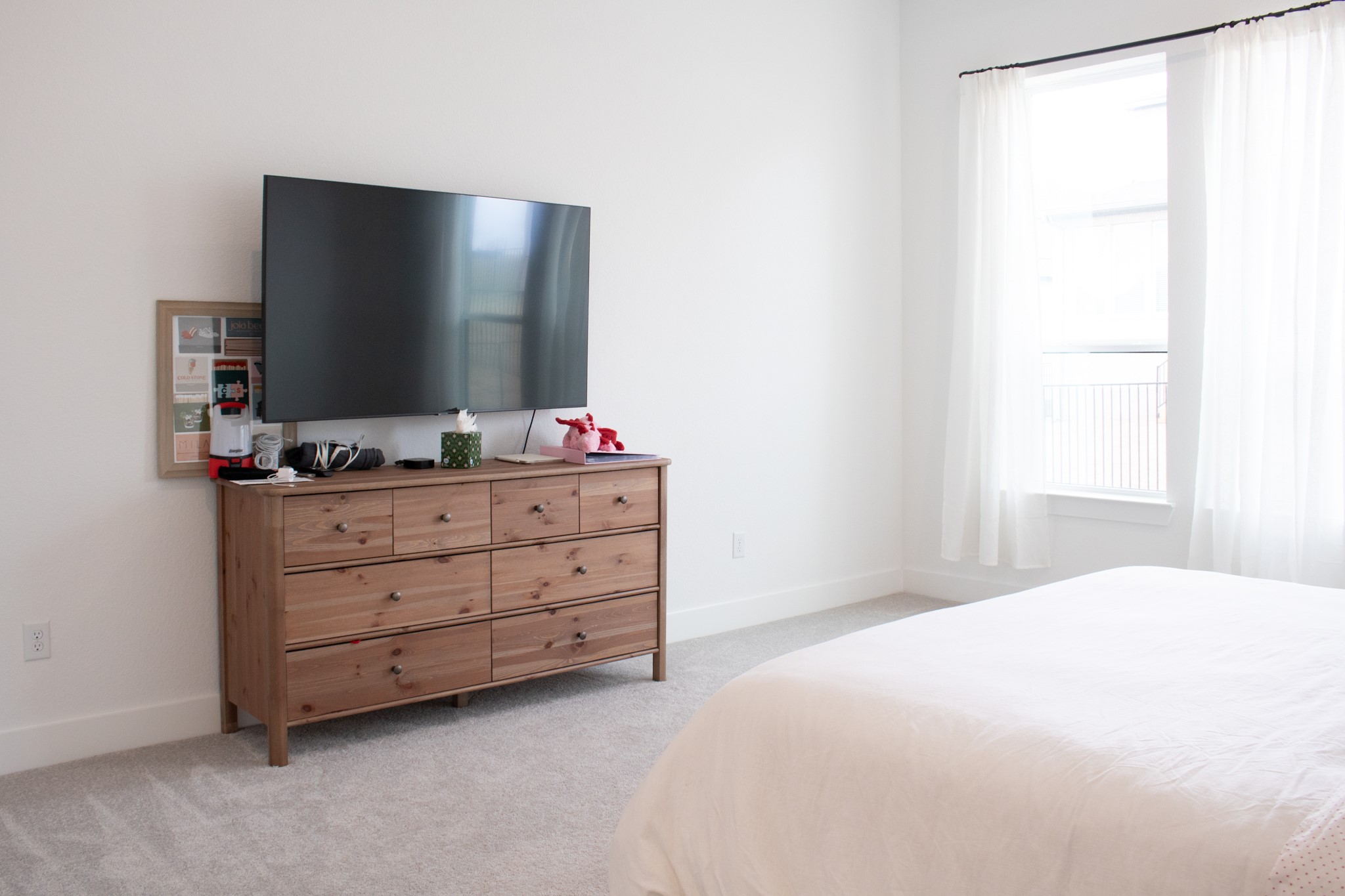 1709 Novara Trail Leander, TX 78641 - Photo 25 of 40 Bedroom featuring light carpet and baseboards