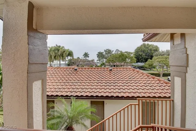 a living room with lots of furniture and a table