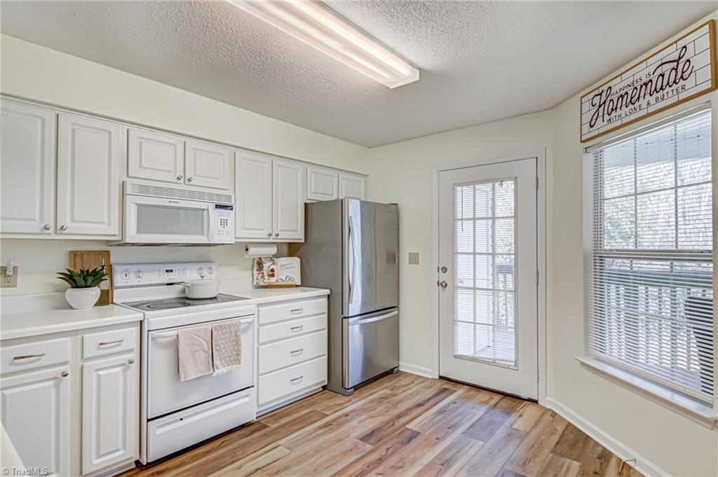 2640 Ingleside Drive, Unit 2D High Point, NC 27265 - Photo 7 of 27 Wonderful kitchen with lots of cabinetry and counterspace.
