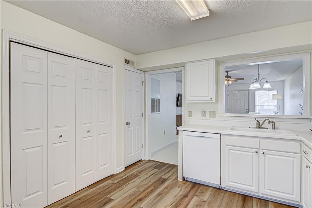 2640 Ingleside Drive, Unit 2D High Point, NC 27265 - Photo 9 of 27 Kitchen also features pantry. Double door closet is the laundry room.