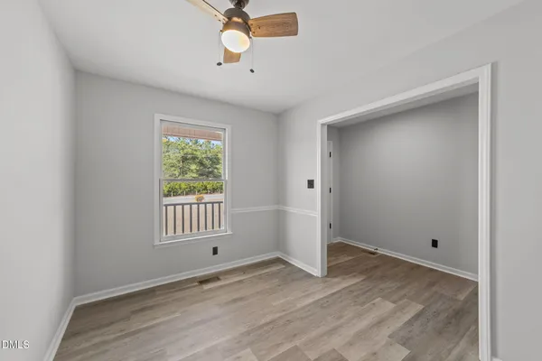 a view of a backyard of the house